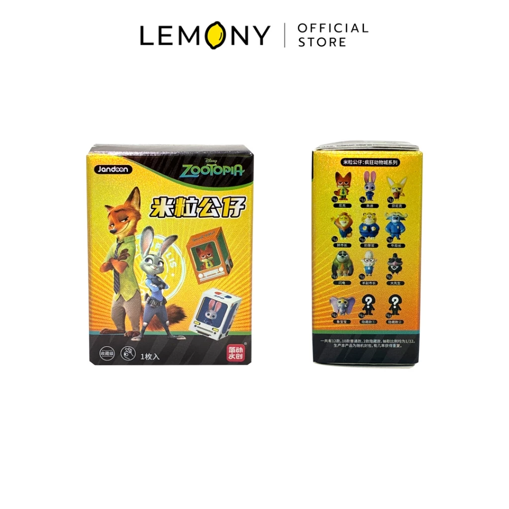 ภาพถ่ายบรรจุภัณฑ์ภายนอก LEMONY กล่องสุ่มมินิฟิกเกอร์ซูโทเปีย ลิขสิทธิ์แท้ดิสนีย์ ด้านซ้ายโชว์หน้ากล่องโทนสีเหลืองส้มพิมพ์ลายจิ้งจอก Nick และกระต่าย Judy มาดกวน ส่วนด้านขวาโชว์ข้างกล่องสีเหลืองที่พิมพ์ภาพตารางรวมตัวละครและเงาปริศนาของตัวซีเคร็ทเพื่ออธิบายเงื่อนไขการสุ่มสะสม