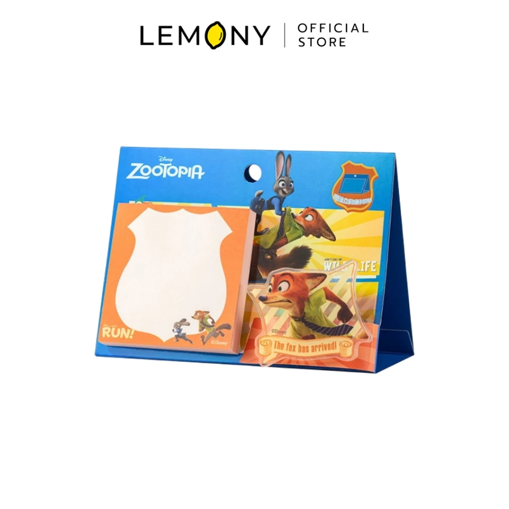 LEMONY กระดาษโน้ตตั้งโต๊ะ ซูโทเปีย ลาย Nick Wilde ดีไซน์ขอบมนแนวยาว โทนสีเขียวมิ้นท์สลับสีส้มอบอุ่น ด้านซ้ายโชว์รูปตัวการ์ตูนสุนัขจิ้งจอก Nick ยืนกอดอกทำหน้ากวนๆ พร้อมพื้นที่ขีดเส้นบรรทัดสำหรับจดเตือนความจำ