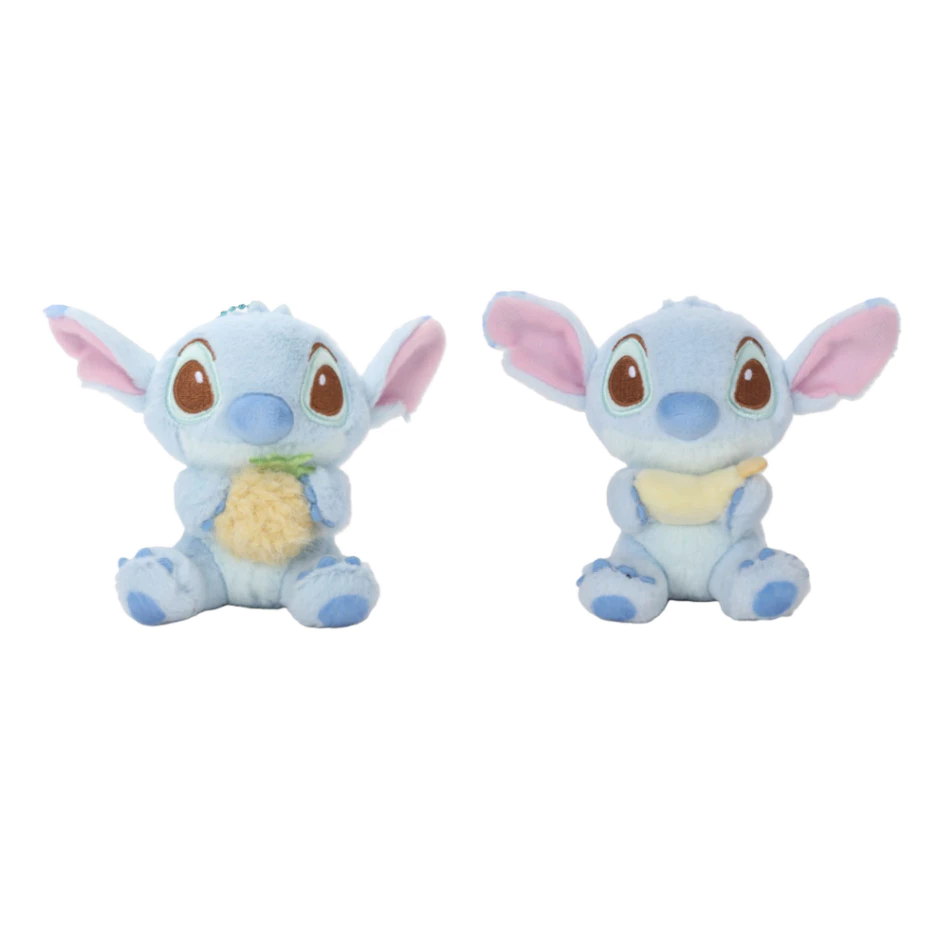 ภาพหลักฉากหลังขาวแสดงรายการสินค้า LEMONY พวงกุญแจสติทช์ถือผลไม้ ขนาด 10CM Stitch Fruity Lying with Pineapple Collection ลิขสิทธิ์แท้ จัดวางพวงกุญแจตุ๊กตาผ้าขนฟูหน้าตรงรูปทรงกลมป้อมสมส่วนในท่านอนคว่ำหมอบราบแยกเป็น 2 ตัวเลือกดีไซน์ ได้แก่ คาแรกเตอร์สติทช์สีฟ้าพาสเทลกอดผลสับปะรดสีเหลืองละมุน และคาแรกเตอร์แองเจิลสีชมพูหวานกอดผลกล้วยหอมสีเหลืองคัลเลอร์ฟูลแนวซิกเนเจอร์สไตล์มินิมอลเกาหลีพรีเมียม โชว์แกนโครงสร้างห่วงโซ่ล็อกโลหะด้านบนแน่นหนา ด้านบนสุดแสดงโลโก้แบรนด์ออฟฟิเชียลเด่นชัดเจน